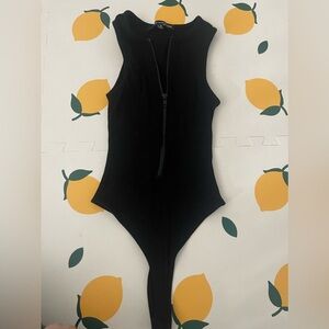 Naked wardrobe and guess bodysuits pre-loved and in great condition.